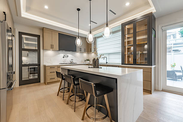 Light wood two-tone kitchen with white countertops